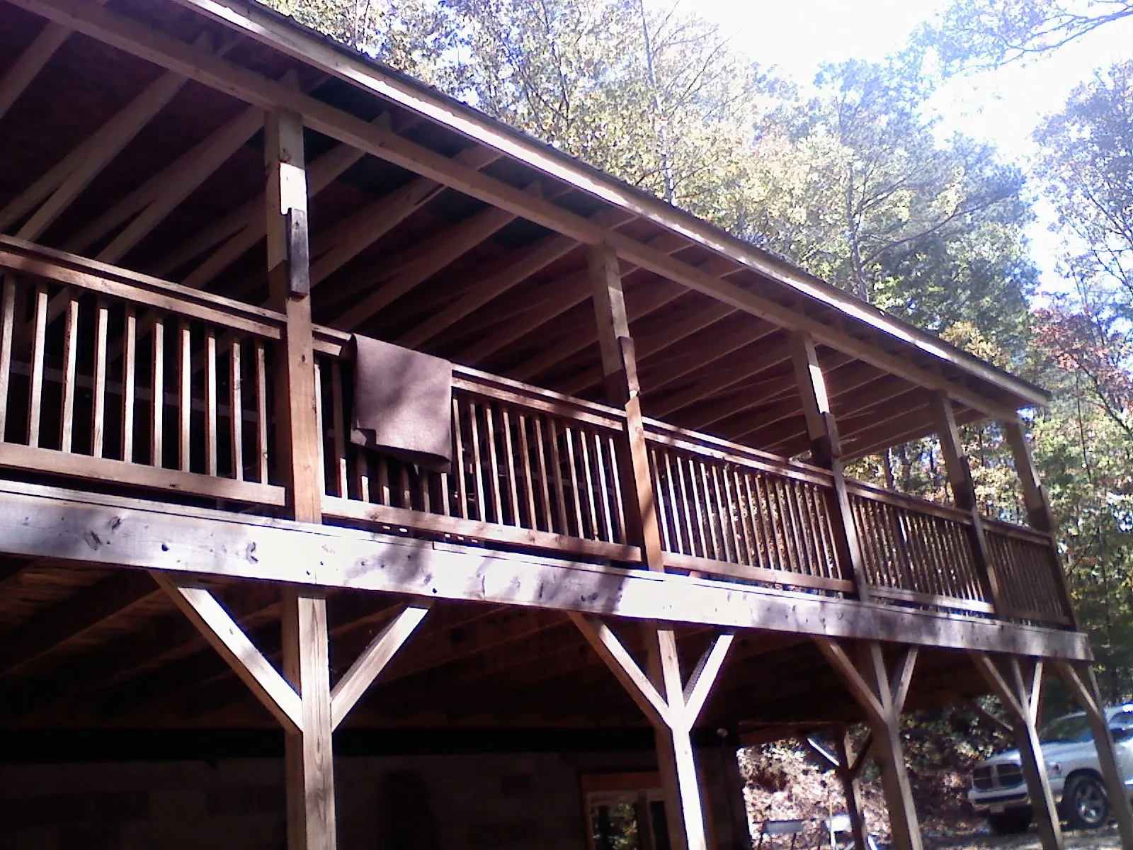 Timber framing under a new elevated porch and deck — Roof Leak Repair in Berkeley by Roofing Brothers